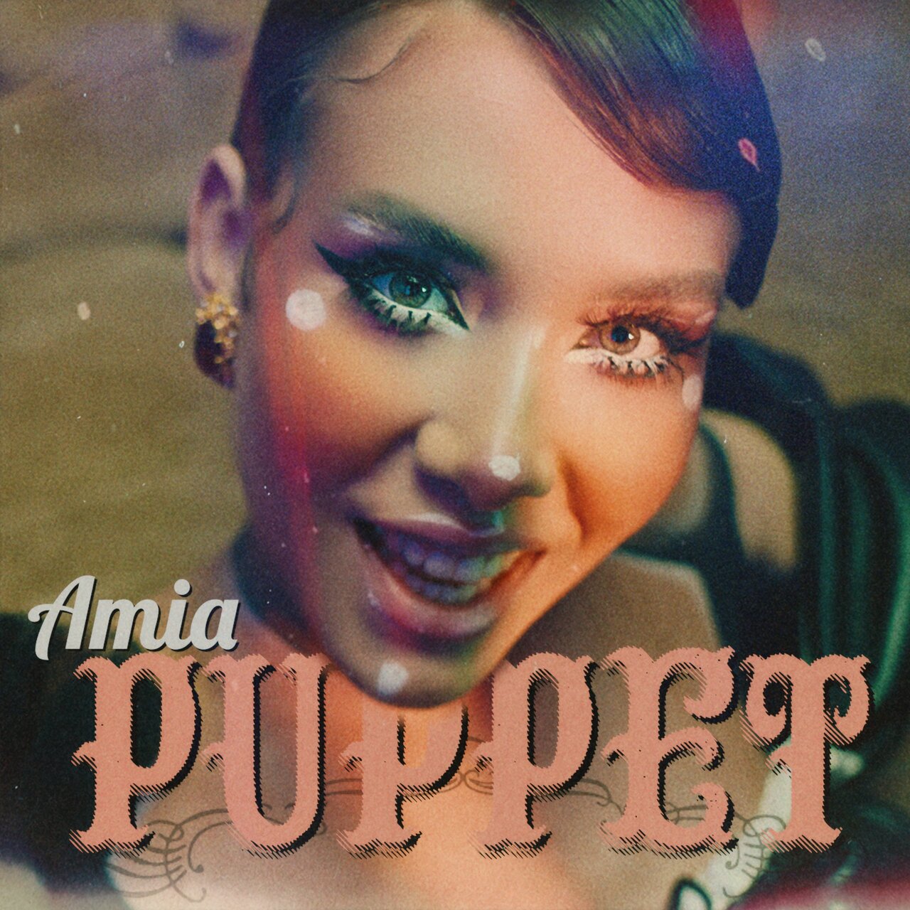 Amia — Puppet cover artwork