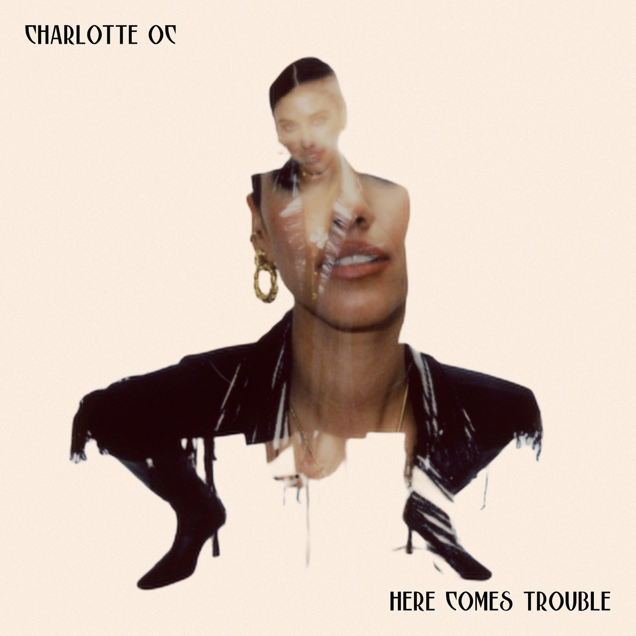 Charlotte OC Here Comes Trouble cover artwork