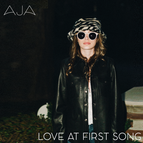 AJA — Love At First Song cover artwork