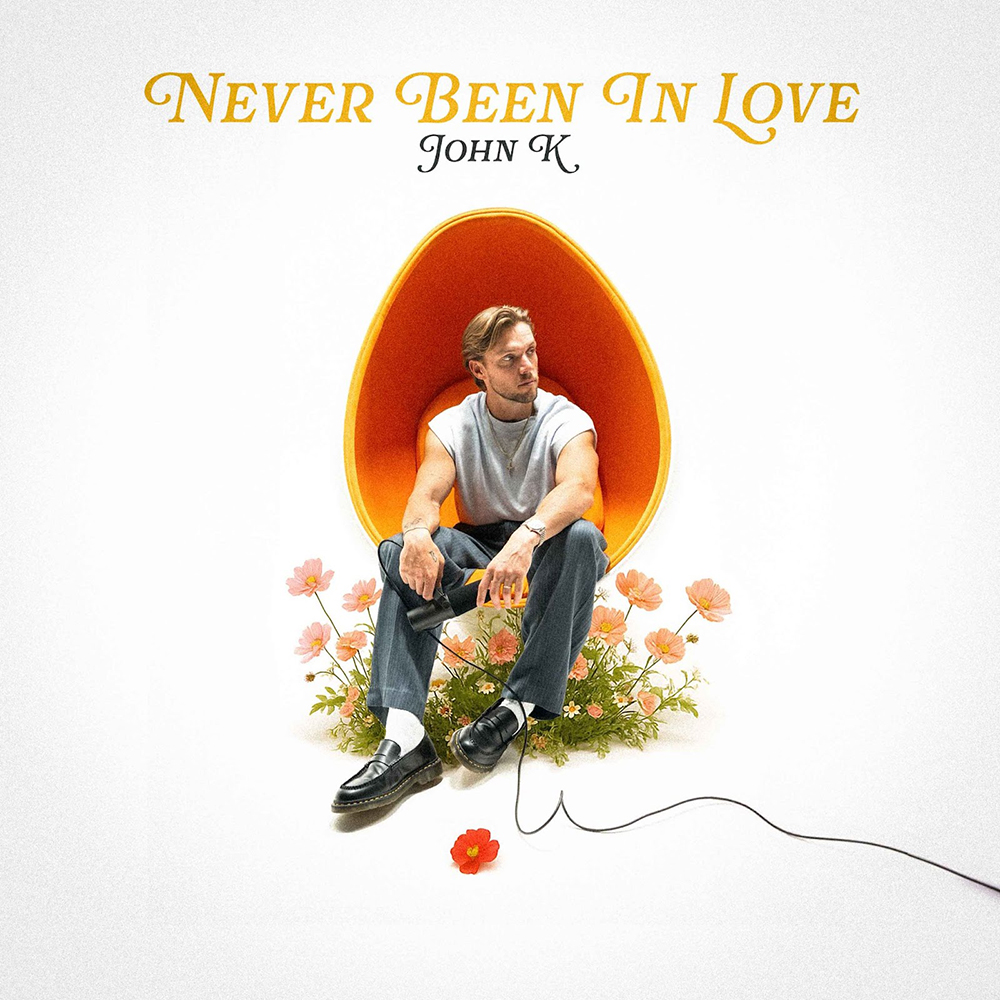 John K — Never Been in Love cover artwork