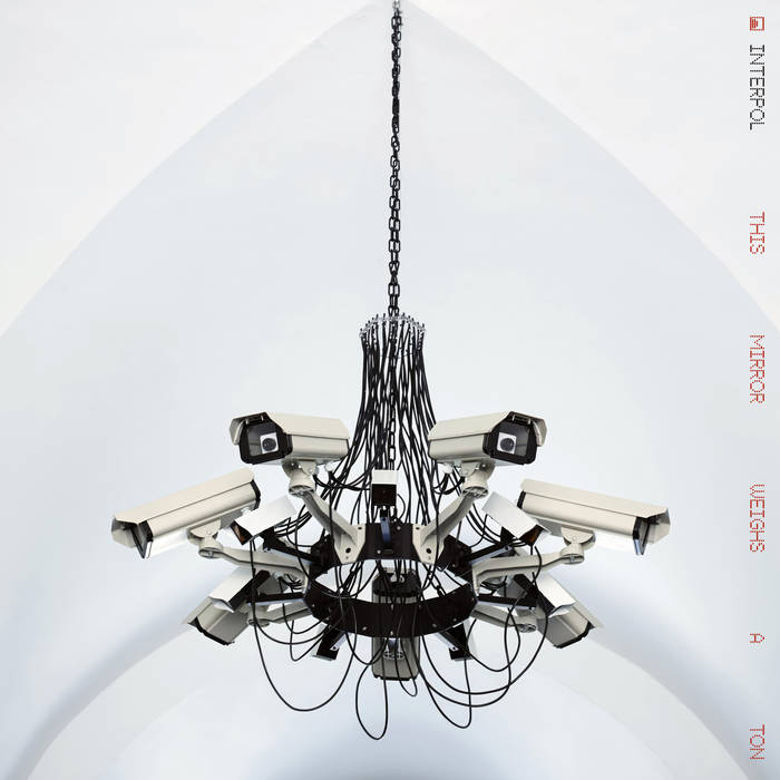 Interpol — This Mirror Weighs a Ton cover artwork