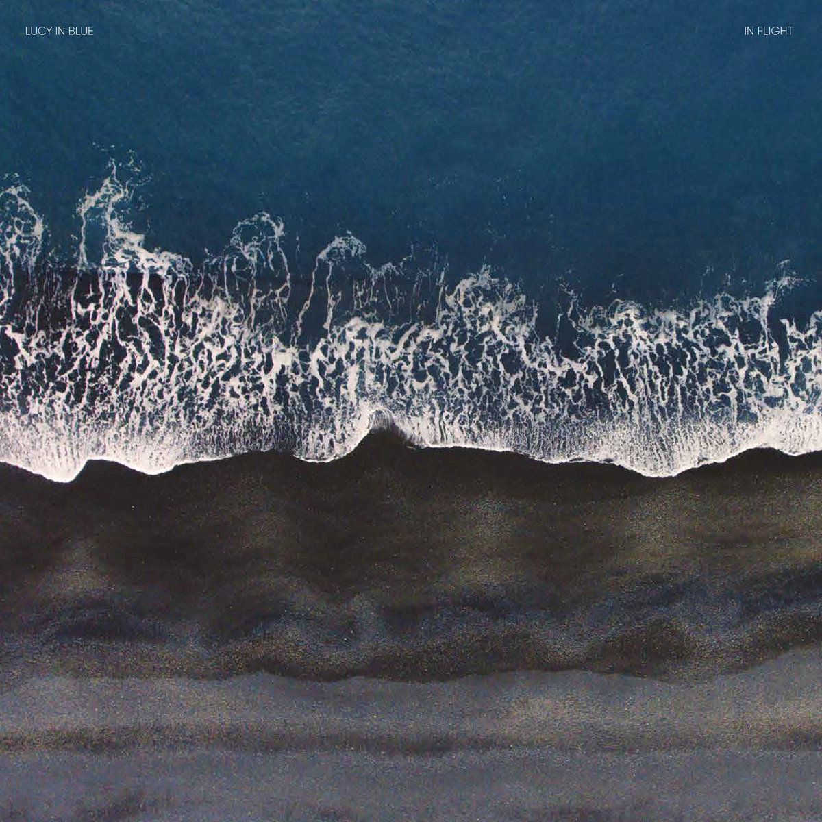 Lucy in Blue — In Flight cover artwork
