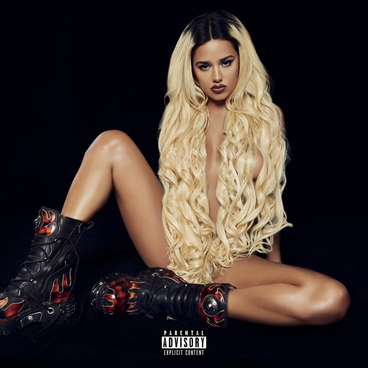 Tommy Genesis a woman is a god cover artwork