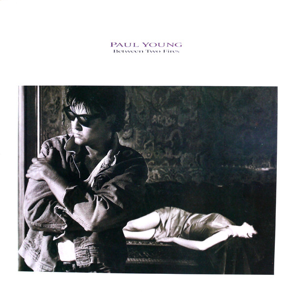 Paul Young Between Two Fires cover artwork