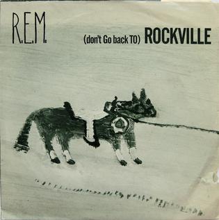 R.E.M. — (Don’t Go Back to) Rockville cover artwork