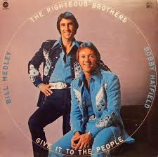 The Righteous Brothers Give It to the People cover artwork